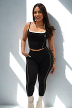 Model wearing Luxòra Atelier’s Nova Power Set in Midnight Black – sleek, sculpted activewear for strength and style